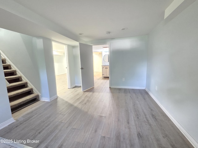 342 E Southside Ct, Louisville, KY 40214 - empty room featuring wood finished floors, stairs, and a smoke detector