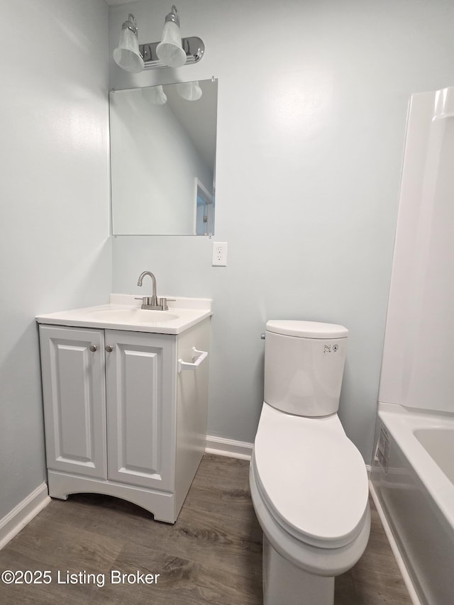 342 E Southside Ct, Louisville, KY 40214 - full bathroom featuring vanity, wood finished floors, and a bathtub