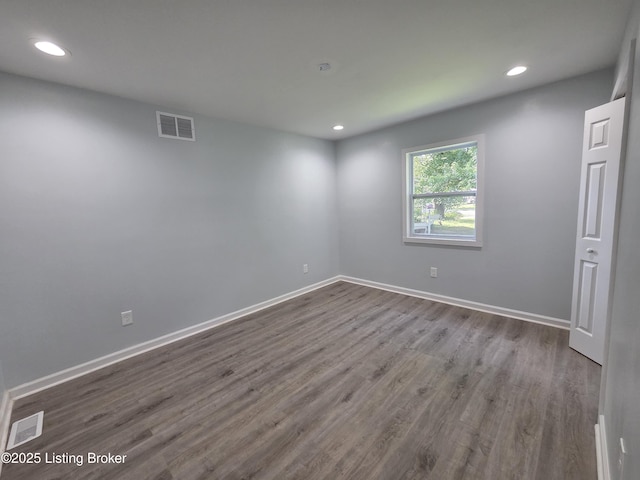 342 E Southside Ct, Louisville, KY 40214 - empty room with recessed lighting and dark wood-type flooring