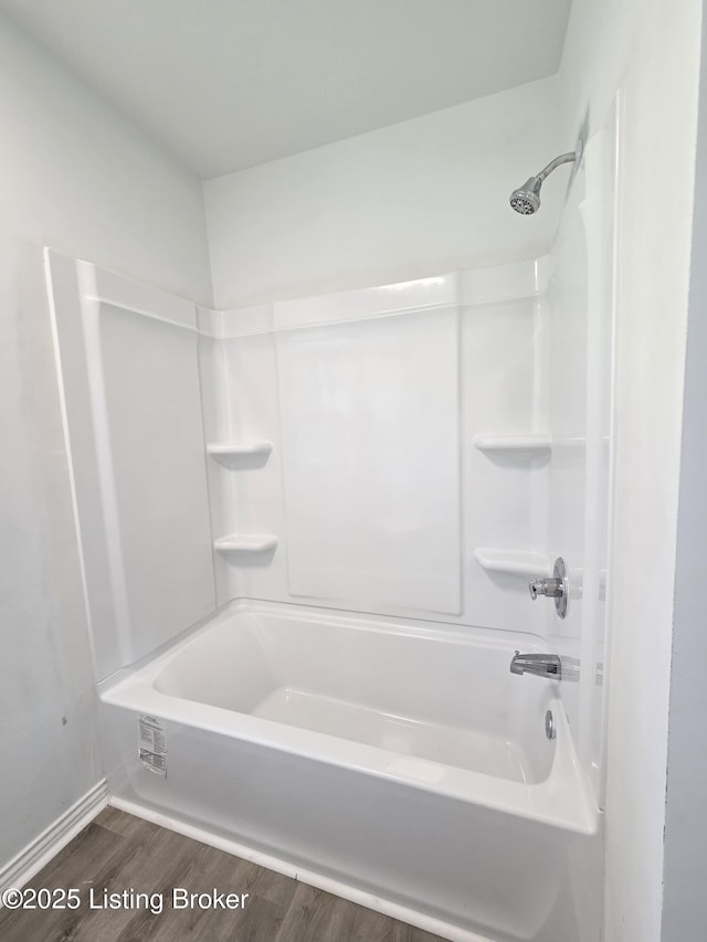 342 E Southside Ct, Louisville, KY 40214 - bathroom featuring wood finished floors and shower / bath combination