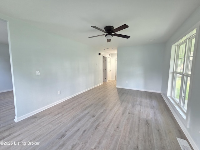 342 E Southside Ct, Louisville, KY 40214 - unfurnished room with wood finished floors and a ceiling fan