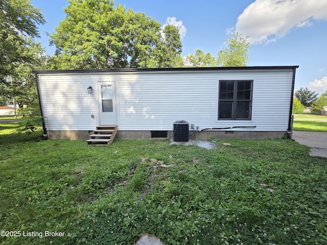 342 E Southside Ct, Louisville, KY 40214 - back of house featuring entry steps and a yard