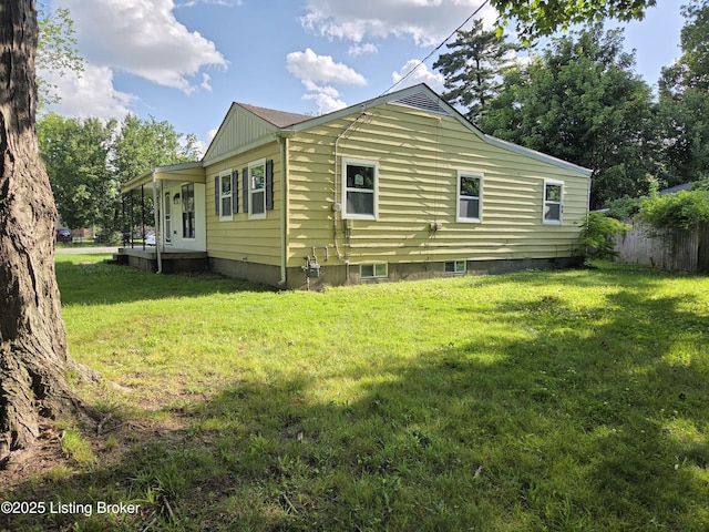 342 E Southside Ct, Louisville, KY 40214 - view of home's exterior with a lawn
