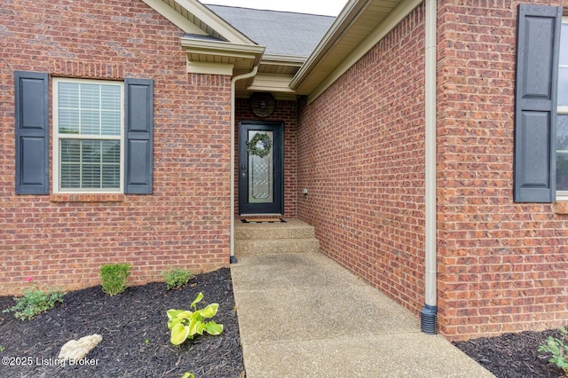 152 Glen Ridge Dr, Mt Washington, KY 40047 - view of exterior entry with brick siding and a shingled roof