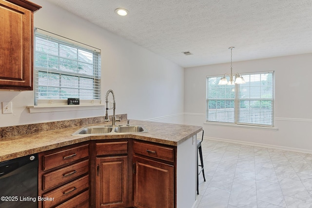 152 Glen Ridge Dr, Mt Washington, KY 40047 - kitchen with dishwasher, light marble finish floors, healthy amount of natural light, a chandelier, and a textured ceiling