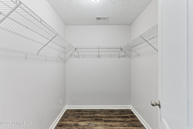 152 Glen Ridge Dr, Mt Washington, KY 40047 - walk in closet featuring dark wood-style floors