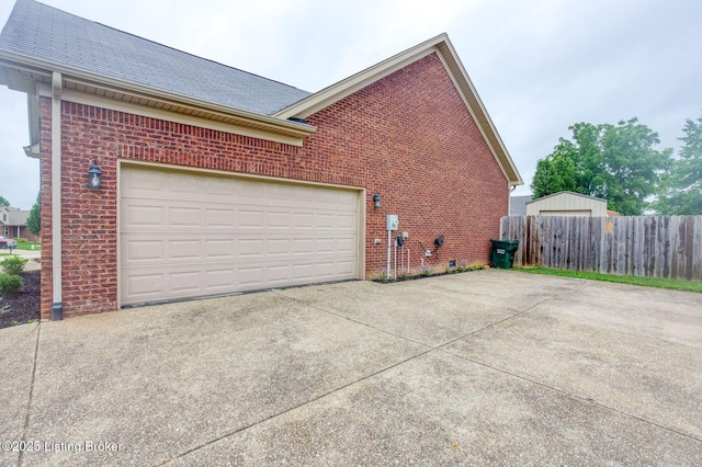 152 Glen Ridge Dr, Mt Washington, KY 40047 - view of home's exterior featuring brick siding, concrete driveway, and a shingled roof