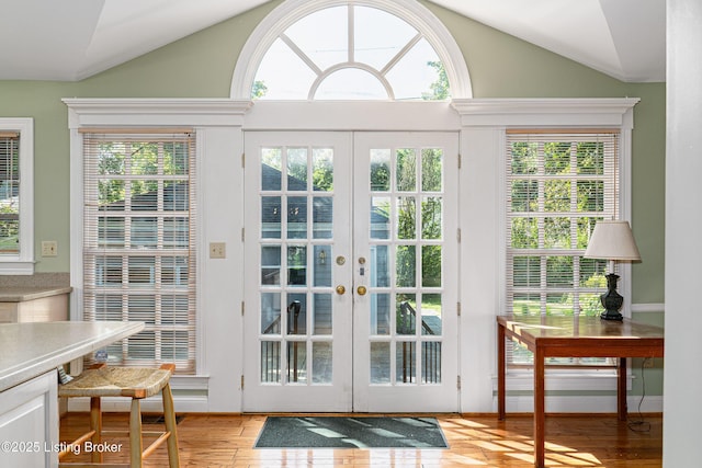 3920 Elfin Ave, Louisville, KY 40207 - doorway with vaulted ceiling, french doors, light wood-style flooring, and plenty of natural light