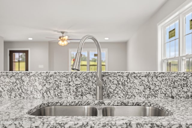 3020 Thorntree Ln, Lawrenceburg, KY 40342 - kitchen view of recessed lighting, light stone counters, and a ceiling fan