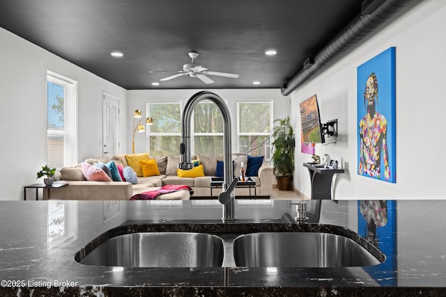 953 Baxter Ave Unit 101, Louisville, KY 40204 - kitchen featuring a ceiling fan, dark stone counters, recessed lighting, and open floor plan