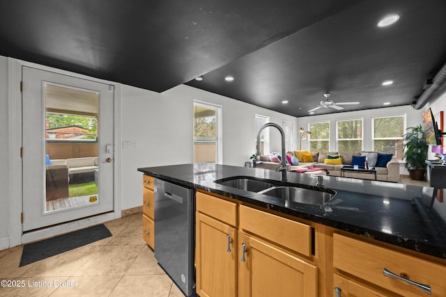 953 Baxter Ave Unit 101, Louisville, KY 40204 - kitchen featuring dishwasher, light tile patterned flooring, dark stone countertops, healthy amount of natural light, and recessed lighting