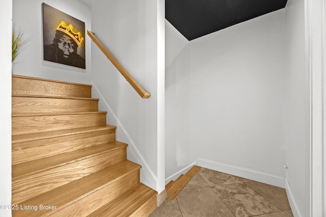 953 Baxter Ave Unit 101, Louisville, KY 40204 - staircase with baseboards and tile patterned flooring