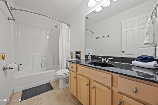 953 Baxter Ave Unit 101, Louisville, KY 40204 - bathroom with shower / bath combo with shower curtain, tile patterned flooring, and vanity