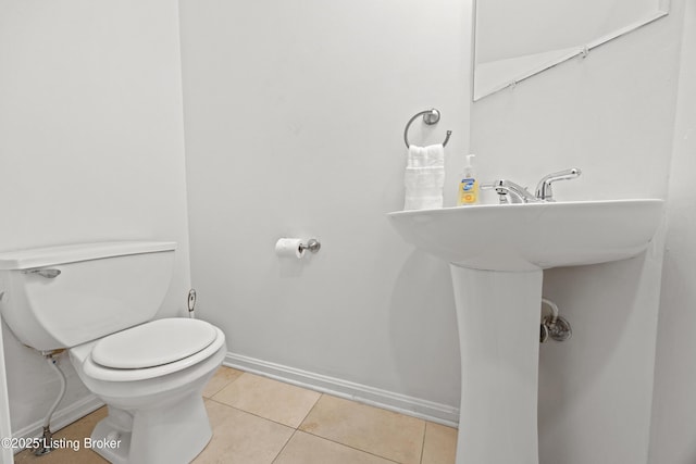 953 Baxter Ave Unit 101, Louisville, KY 40204 - half bathroom featuring tile patterned flooring and toilet