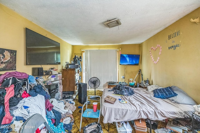 911 N Main St, Barbourville, KY 40906 - bedroom featuring a textured ceiling
