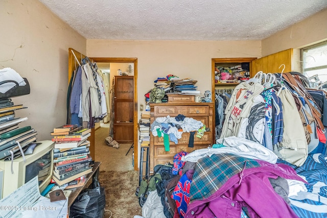 911 N Main St, Barbourville, KY 40906 - carpeted bedroom featuring a textured ceiling and a closet