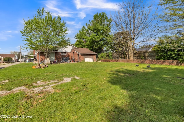 911 N Main St, Barbourville, KY 40906 - view of yard with an attached garage