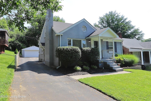 3303 Eagle Pass, Louisville, KY 40213 - view of front of property with a chimney, an outdoor structure, a garage, and brick siding