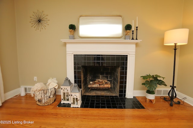 3303 Eagle Pass, Louisville, KY 40213 - detailed view of wood finished floors and a tiled fireplace