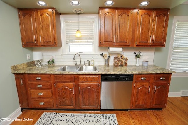 3303 Eagle Pass, Louisville, KY 40213 - kitchen featuring stainless steel dishwasher, light wood-style floors, backsplash, light countertops, and recessed lighting