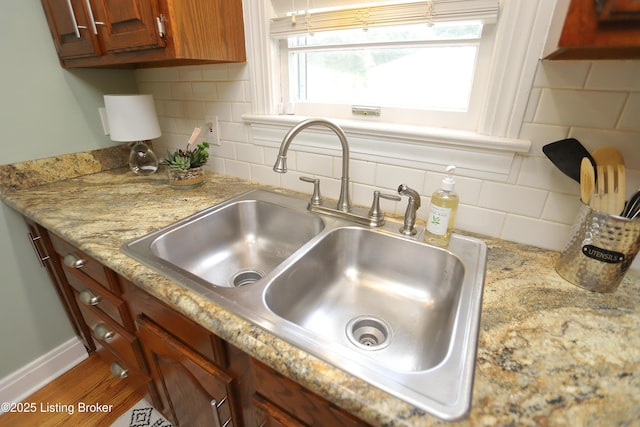 3303 Eagle Pass, Louisville, KY 40213 - kitchen view of decorative backsplash, light stone counters, and brown cabinets