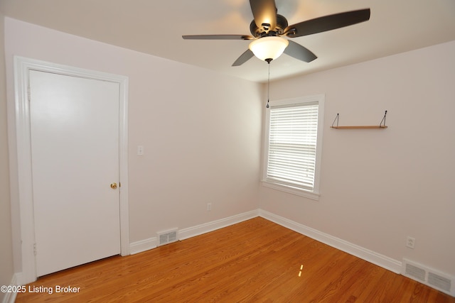 3303 Eagle Pass, Louisville, KY 40213 - empty room featuring light wood-style floors and a ceiling fan