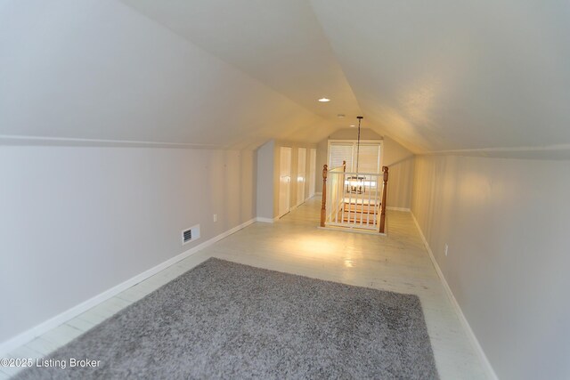 3303 Eagle Pass, Louisville, KY 40213 - additional living space featuring vaulted ceiling and carpet floors