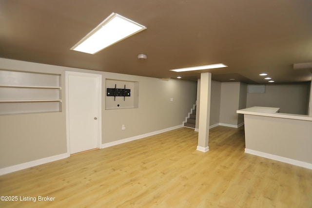 3303 Eagle Pass, Louisville, KY 40213 - finished basement with light wood-style flooring, stairway, and recessed lighting