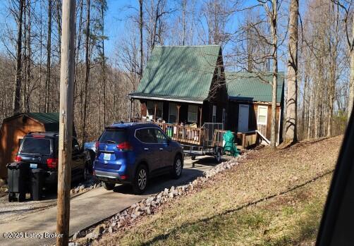215 Bentley Cir, Wellington, KY 40387 - view of front of property featuring a porch and a metal roof