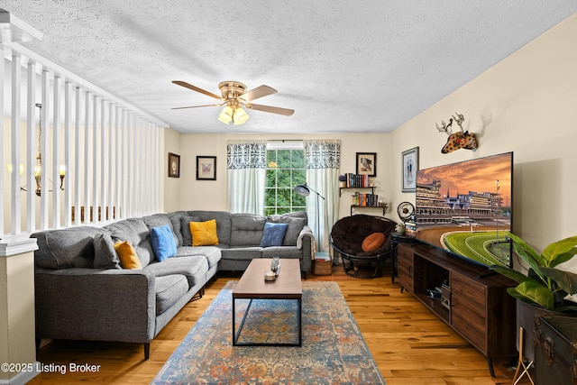 3403 Endeavor Way, Louisville, KY 40219 - living area featuring ceiling fan, light wood-type flooring, and a textured ceiling