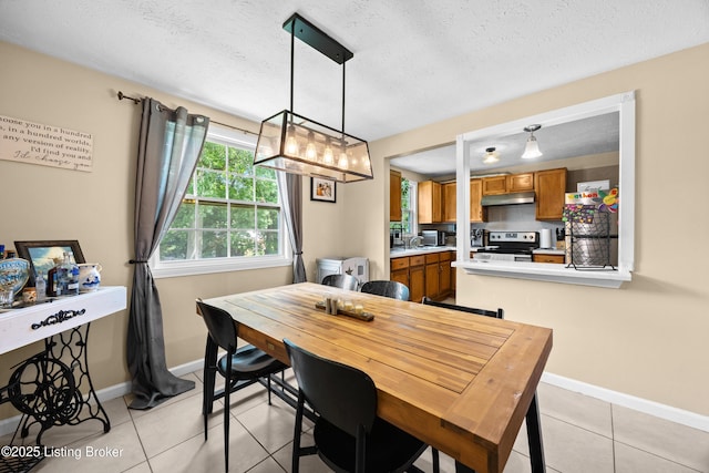 3403 Endeavor Way, Louisville, KY 40219 - dining space with light tile patterned flooring and a textured ceiling