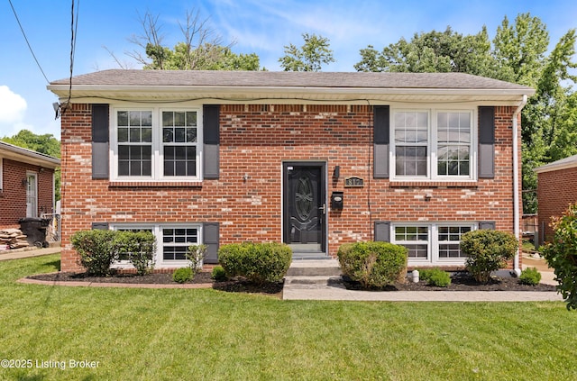 817 Iroquois Ave, Louisville, KY 40214 - raised ranch with a front yard and brick siding