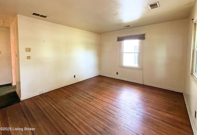 3809 Algonquin Pkwy, Louisville, KY 40211 - spare room featuring dark wood-type flooring