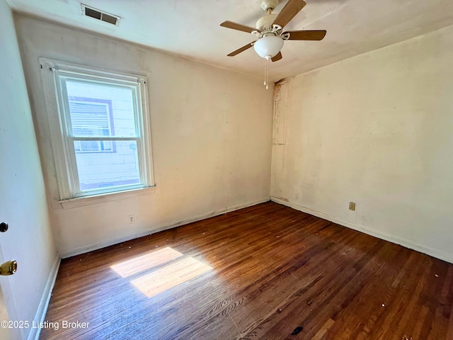 3809 Algonquin Pkwy, Louisville, KY 40211 - unfurnished room with dark wood-style floors and a ceiling fan