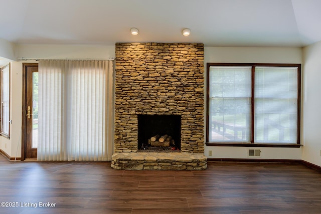 4401 Greenhaven Ln, Goshen, KY 40026 - unfurnished living room featuring wood finished floors and a stone fireplace