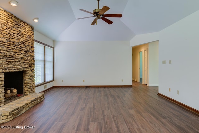 4401 Greenhaven Ln, Goshen, KY 40026 - unfurnished living room with a ceiling fan, vaulted ceiling, dark wood-style flooring, and a stone fireplace