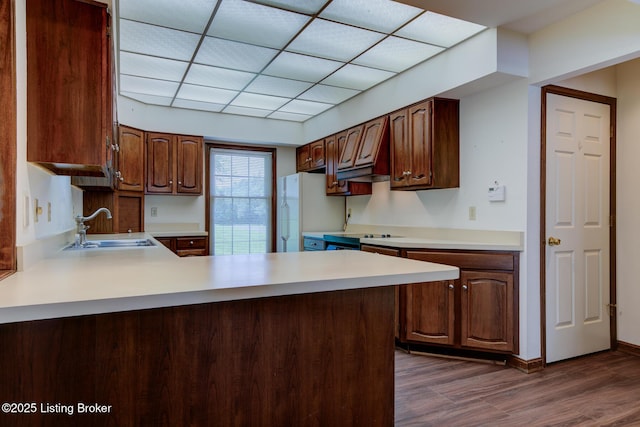 4401 Greenhaven Ln, Goshen, KY 40026 - kitchen with freestanding refrigerator, light countertops, custom exhaust hood, and a peninsula