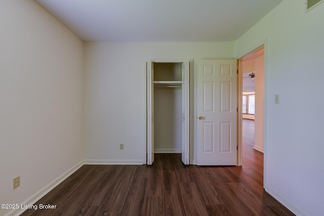 4401 Greenhaven Ln, Goshen, KY 40026 - unfurnished bedroom with dark wood-type flooring and a closet
