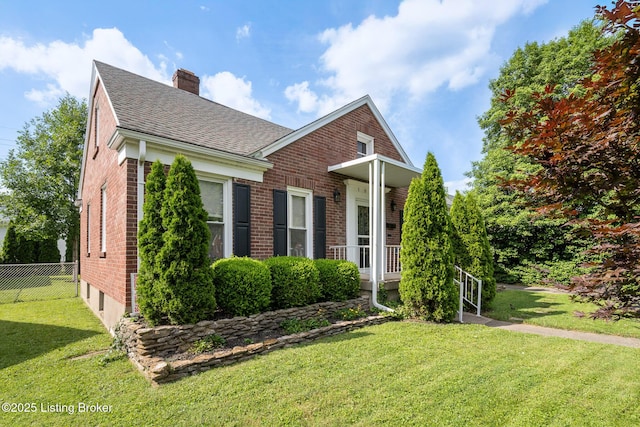 1005 Rosemary Dr, Louisville, KY 40213 - view of side of home featuring brick siding, a chimney, roof with shingles, a porch, and an attached garage