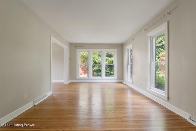 1005 Rosemary Dr, Louisville, KY 40213 - unfurnished room featuring light wood-style flooring and healthy amount of natural light