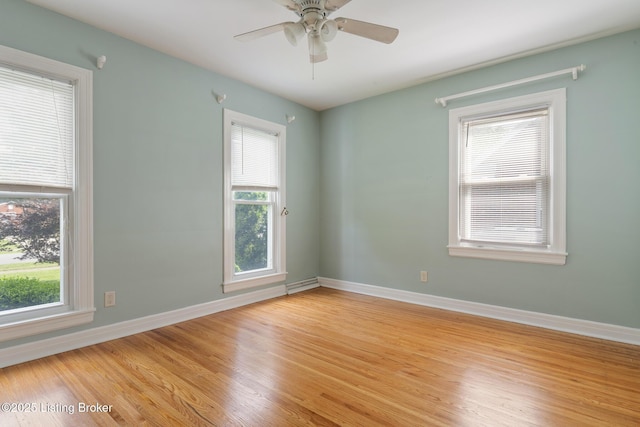 1005 Rosemary Dr, Louisville, KY 40213 - spare room featuring healthy amount of natural light, light wood-style floors, and a ceiling fan