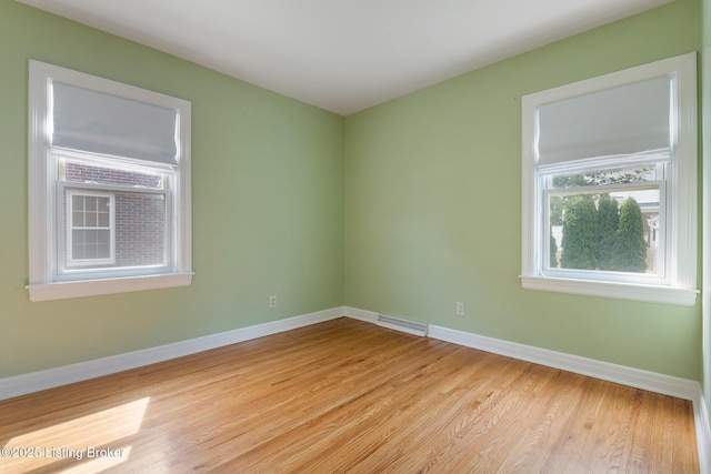 1005 Rosemary Dr, Louisville, KY 40213 - empty room with light wood-style floors and baseboards