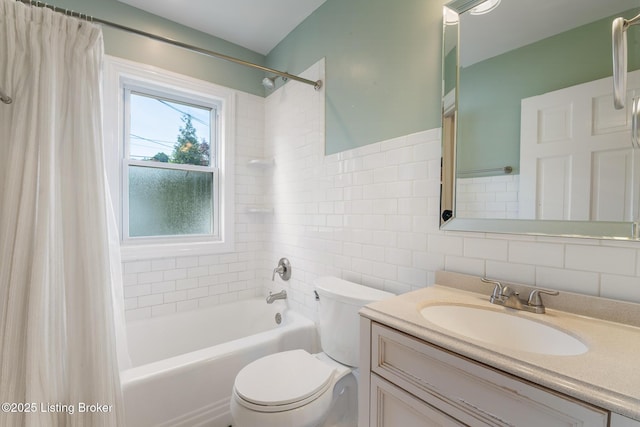 1005 Rosemary Dr, Louisville, KY 40213 - full bathroom featuring shower / bath combo, tile walls, vanity, and tasteful backsplash