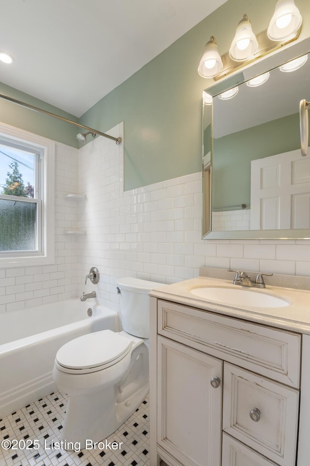 1005 Rosemary Dr, Louisville, KY 40213 - full bathroom with tile walls, vanity, shower / bath combination, and tile patterned flooring