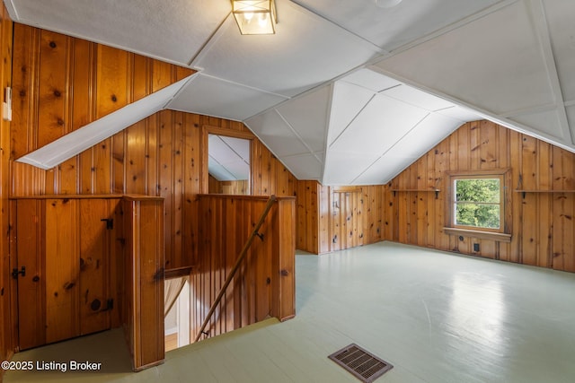 1005 Rosemary Dr, Louisville, KY 40213 - additional living space featuring wooden walls, vaulted ceiling, and wood finished floors