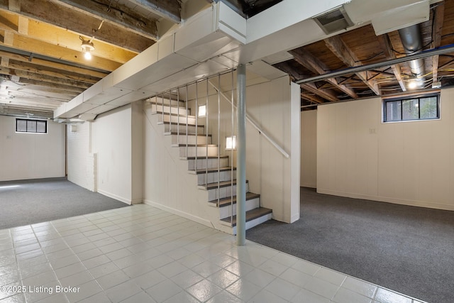 1005 Rosemary Dr, Louisville, KY 40213 - below grade area with plenty of natural light, stairway, and carpet floors