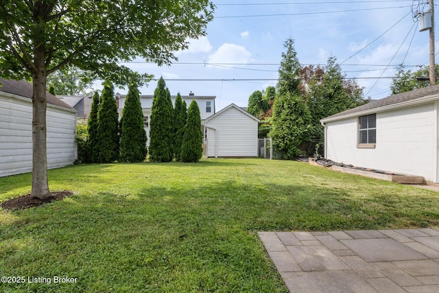 1005 Rosemary Dr, Louisville, KY 40213 - view of green lawn with a shed