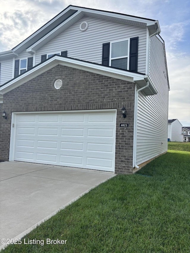 4021 White Pine Ln, La Grange, KY 40031 - view of front of home featuring brick siding, driveway, and a front lawn