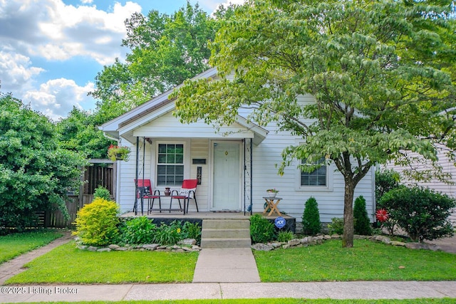 129 E Park Pl, Jeffersonville, IN 47130 - bungalow-style home with a porch
