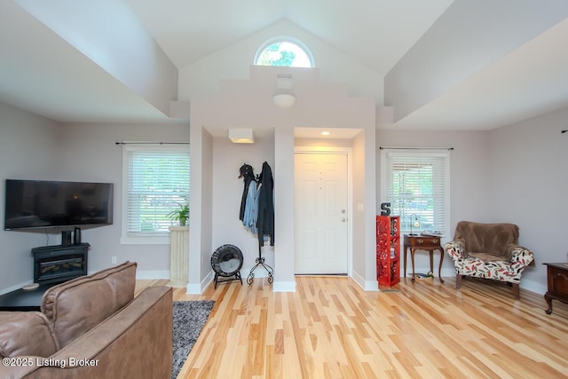 129 E Park Pl, Jeffersonville, IN 47130 - living room featuring wood finished floors and lofted ceiling